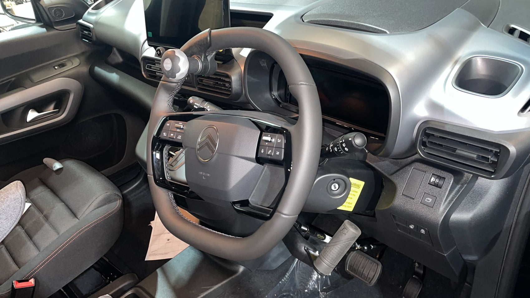 Hand controls fitted to a Citroen Berlingo