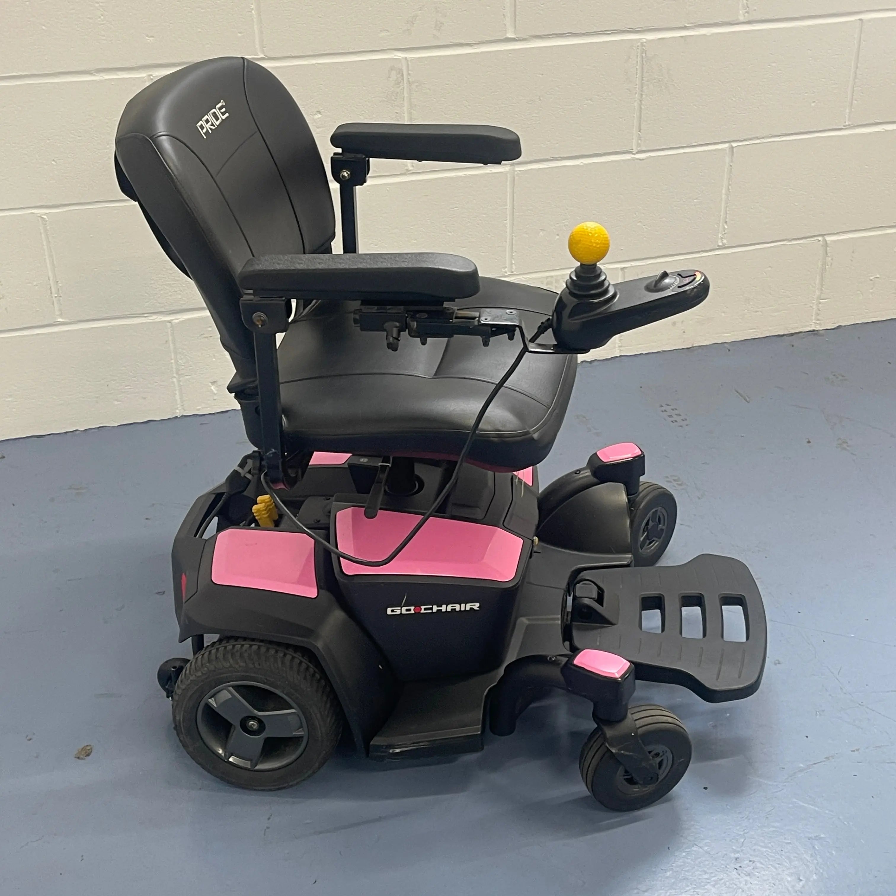 Pride Go Chair - The Portable Electric Powered Wheelchair Pink Mobility Station