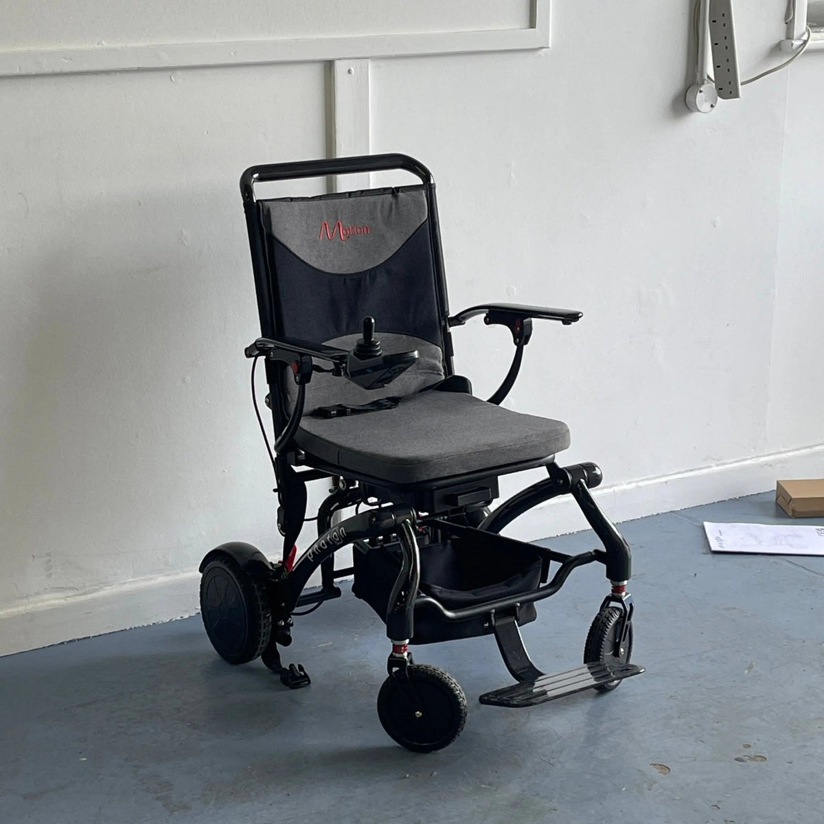 Motion Healthcare Photon Carbon Fibre Electric Wheelchair USED Folding Powered Wheelchairs Mobility Station