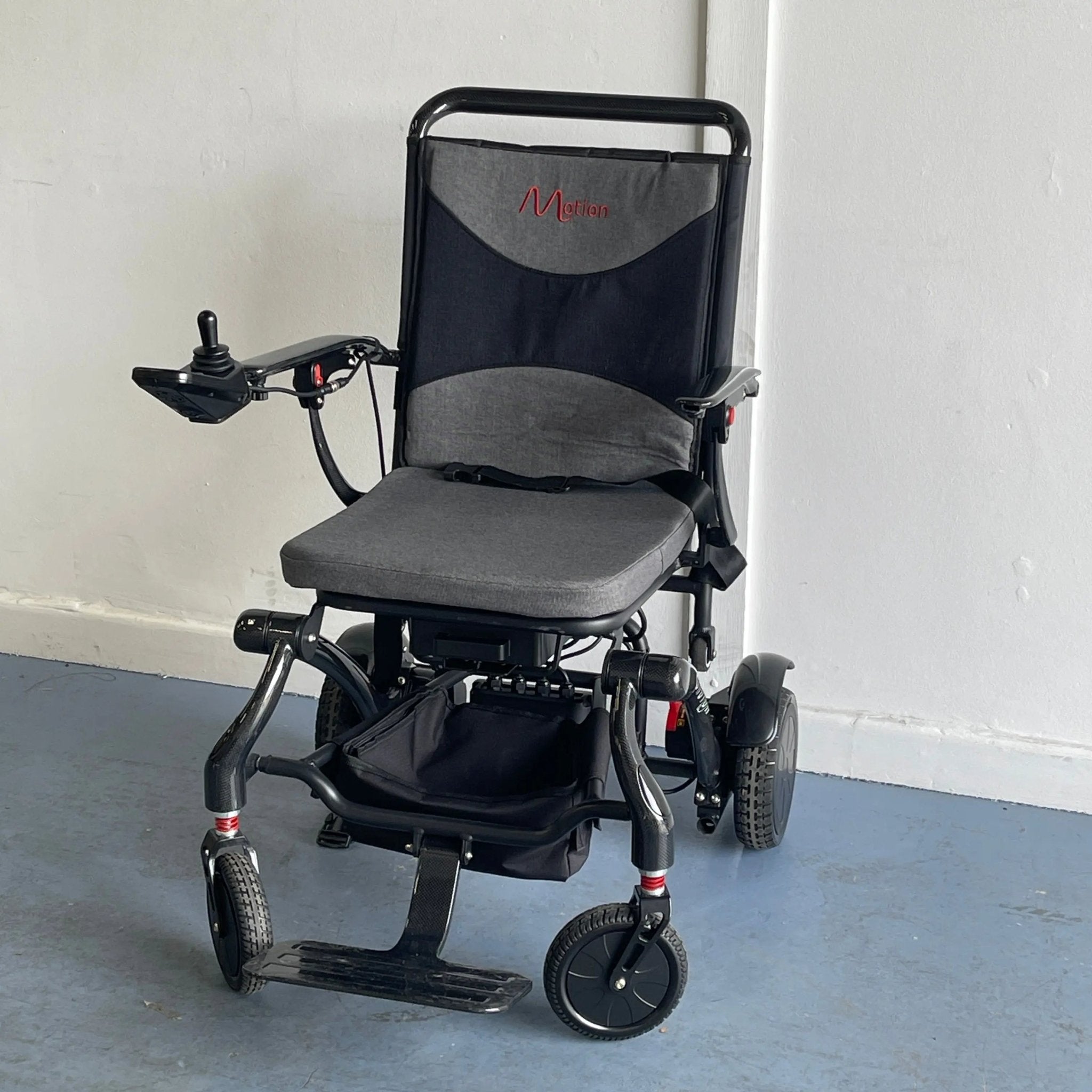 Motion Healthcare Photon Carbon Fibre Electric Wheelchair USED Folding Powered Wheelchairs Mobility Station
