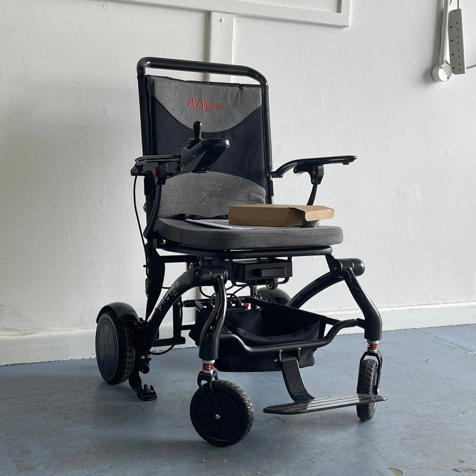 Motion Healthcare Photon Carbon Fibre Electric Wheelchair USED Folding Powered Wheelchairs Mobility Station