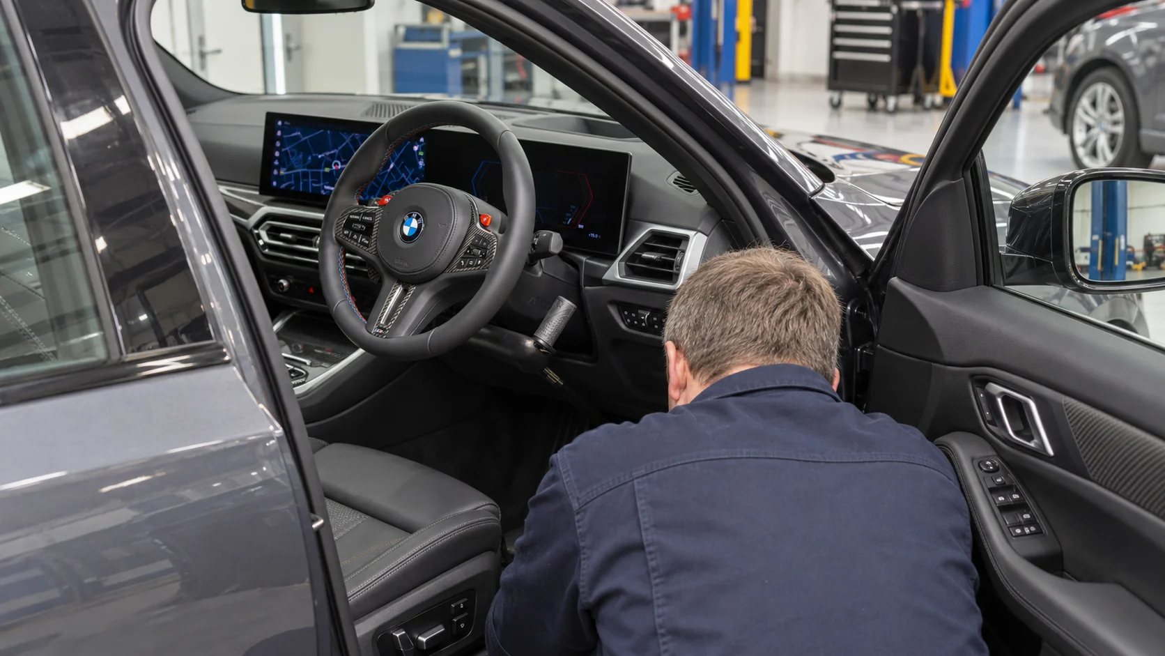 AI-created scene of an engineer crouching with his back to the camera at an open driver doorway, with fitted Jeff Gosling hand controls visible
